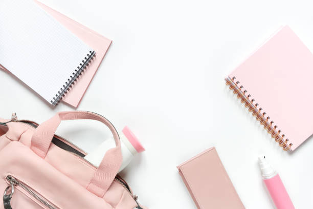 istock Flat lay, Women's accessories pink backpack, glider, water bottle and spray for the face on a white background, trend things girl generation z, fashion background 1204858044