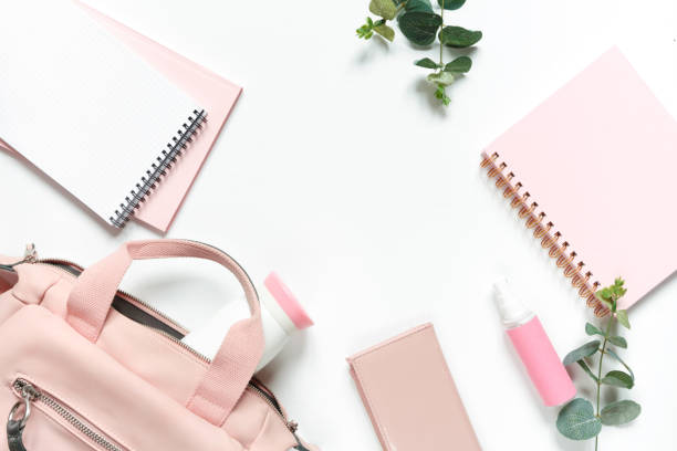 istock Flat lay, Women's accessories pink backpack, glider, water bottle and spray for the face on a white background, trend things girl generation z, fashion background 1204858057