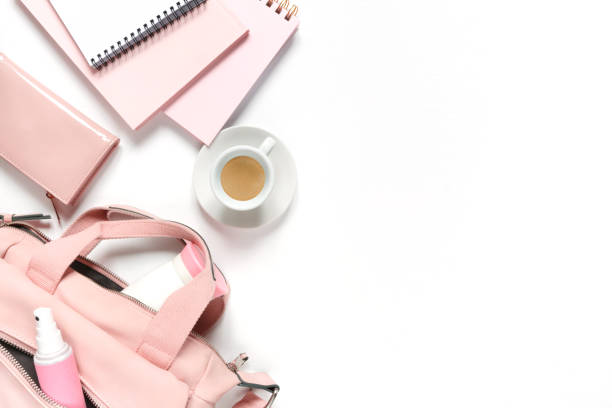 istock Flat lay, Women's accessories pink backpack, glider, water bottle and spray for the face on a white background, trend things girl generation z, fashion background 1204858085