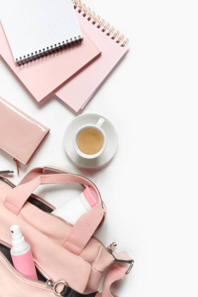 istock Flat lay, Women's accessories pink backpack, glider, water bottle and spray for the face on a white background, trend things girl generation z, fashion background 1204858092