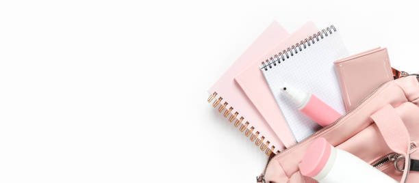 istock Flat lay, Women's accessories pink backpack, glider, water bottle and spray for the face on a white background, trend things girl generation z, fashion background banner 1204858105