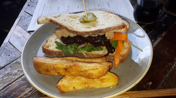 a sandwich with potaoes and vegetables