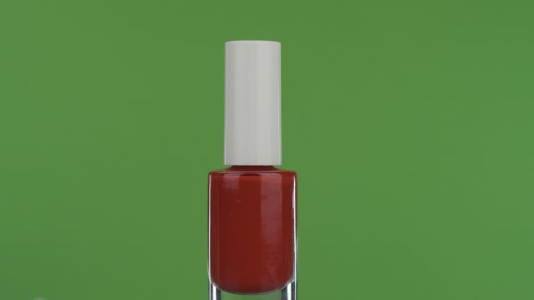 Closeup Rotation Of Red Nail Polish On A Green Screen Stock Video - Download Video Clip Now - iStock Closeup Rotation Of Red Nail Polish On A Green Screen Stock Video - Download Video Clip Now - Istock