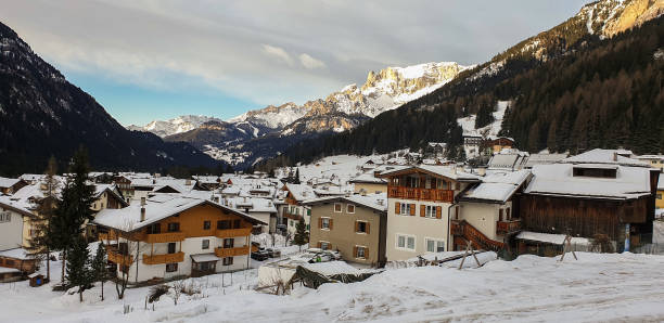 istock Campitello Di Fassa on winter day in Dolomites 1204862638