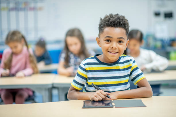 istock African Boy Using a Digital Slate stock photo 1204871739