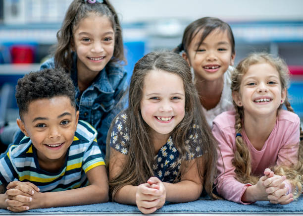 istock Elementary Students Pyramid Portrait stock photo 1204871783