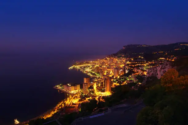Photo of Monte Carlo city at night. Monaco
