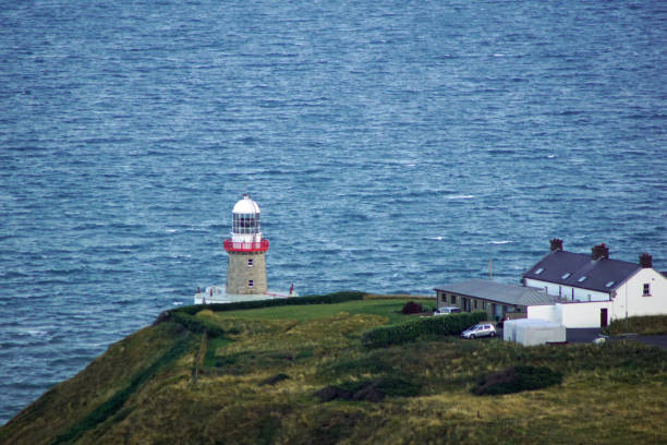 istock Sunset on the Hill of Howth  Baily Lighthouse 1204876301