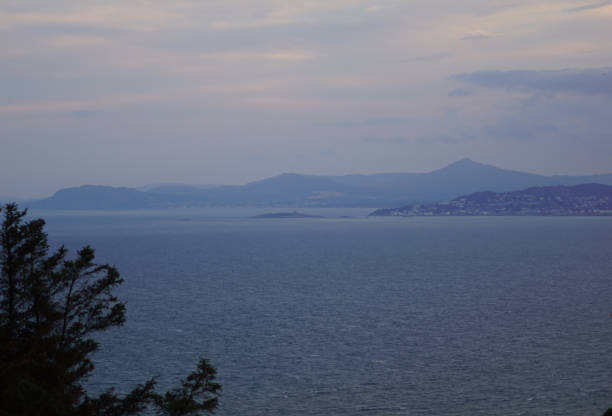 istock Sunset on the Hill of Howth  Baily Lighthouse 1204876411