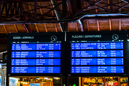 Digital arrivals and departures board on the main railway station of Romania, Bucharest North Railway Station (Gara de Nord Bucuresti), Bucharest, Romania, 2020