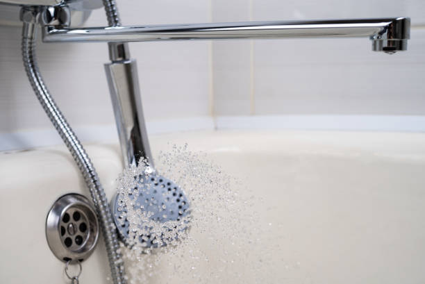 istock Jets of water flow from the shower head. 1204877929
