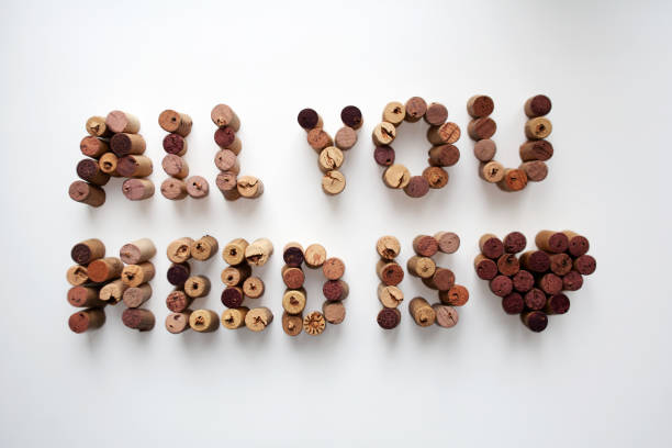 istock Wine corks ALL YOU NEED IS LOVE valentine 1204880576