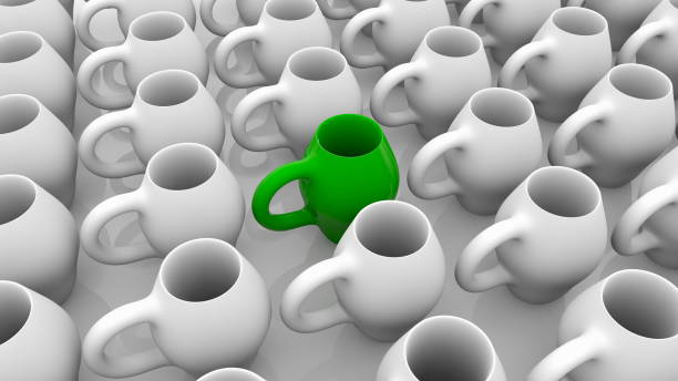 istock Rows of white pitchers with green one in the middle 1204883124