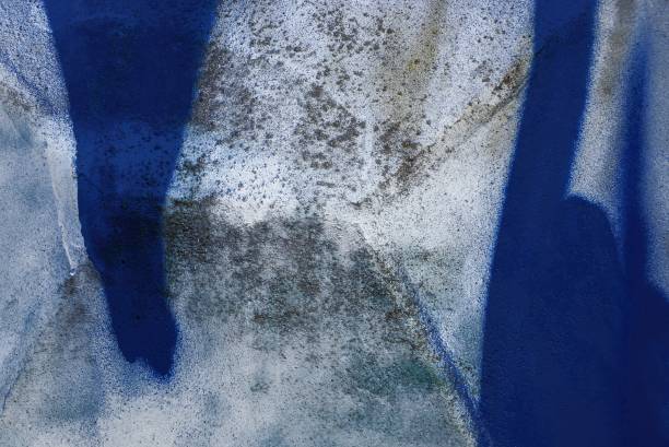 istock blue white texture of colored paint on a dirty concrete fence 1204886557