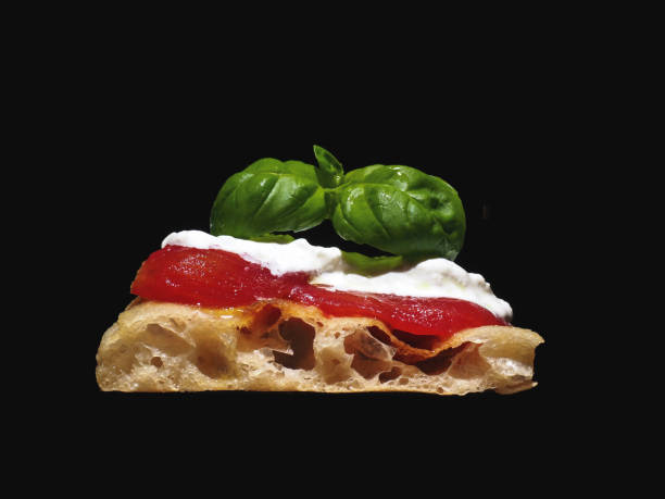 Raw ingredients on pizza