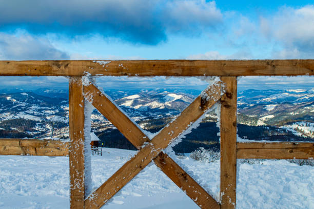 istock View of Carpathian mountains through a fence 1204893850