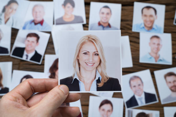 istock Businessman Making Candidate Selection For Job 1204894257