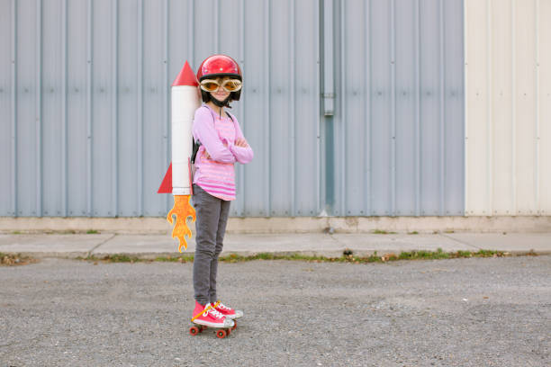 istock Young Girl Wearing Rocket and Skates 1204896391