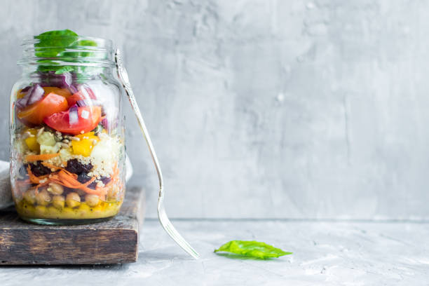 istock Fresh colorful salad in the jar 1204898892