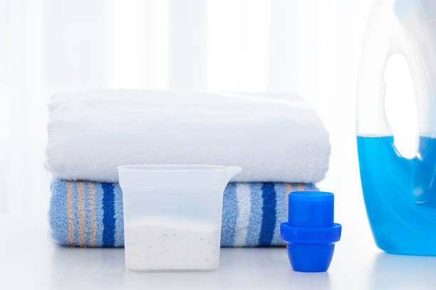 istock Choice between washing liquid and detergent powder concept. 1204899053