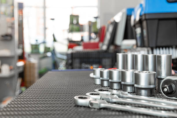 istock Car repair tools, wrench tool set on a black texture background 1204903277