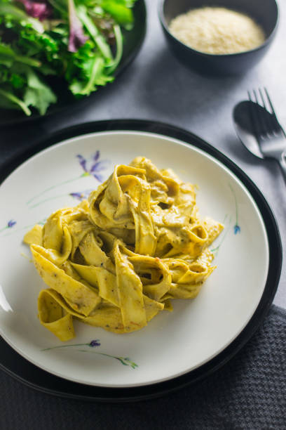 istock Basil Pesto Tomato Pappardelle 1204908205
