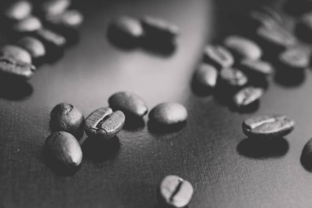 istock Black and white photo of coffee beans 1204910063