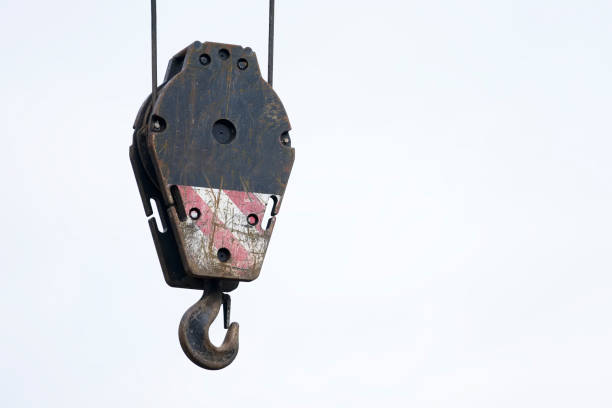 istock Crane jaw lifting hook accessory close up in sky 1204916301