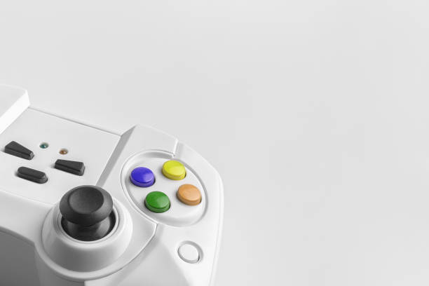 istock White wireless gamepad for playing video games. Joystick on a white background. Game controller close up. Minimal. 1204919364