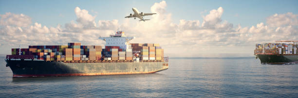 istock Mighty container ships in ocean at sunrise underway performing import and export marine cargo transportation. 1204920291