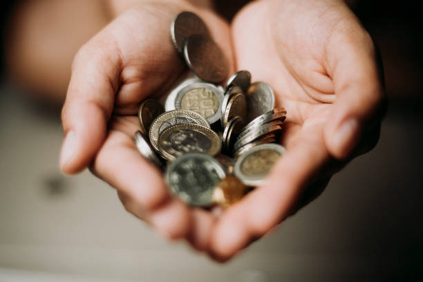 colombian currency coins lying around - food currency breakfast business imagens e fotografias de stock