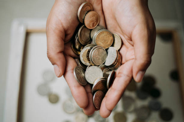 istock Colombian currency coins lying around 1204923009