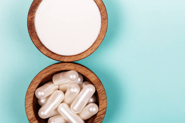istock Collagen in capsules and in powder 1204923185