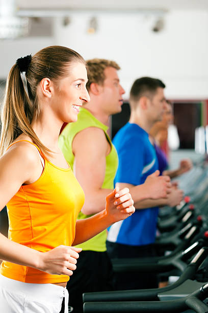 istock People in gym on treadmill running 120492584