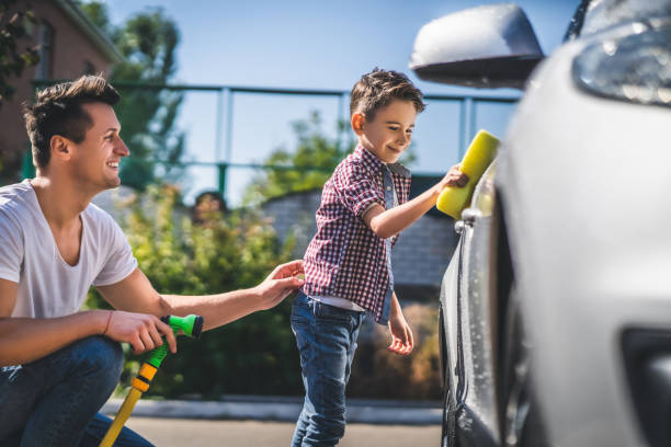 istock The father and son cleaning the car 1204931082