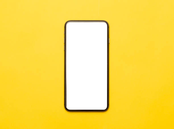 istock Black smartphone with blank screen mockup isolated on yellow background. Clipping path 1204938970