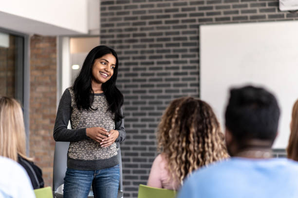 istock University Student Giving a Presentation stock photo 1204939206