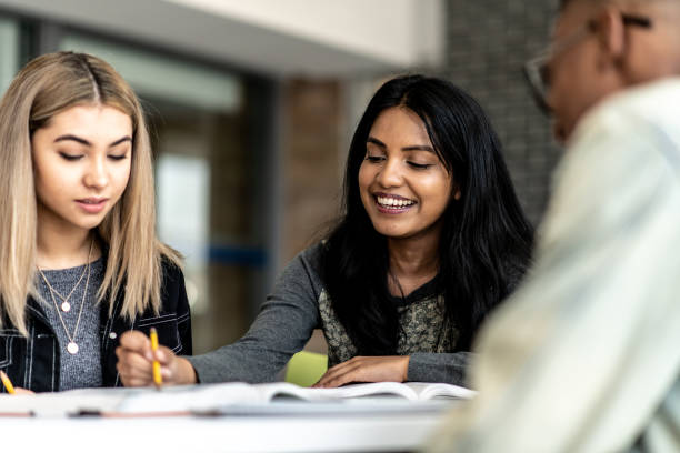 istock University Students Studying Together stock photo 1204939231