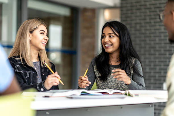 istock University Students Studying Together stock photo 1204939232