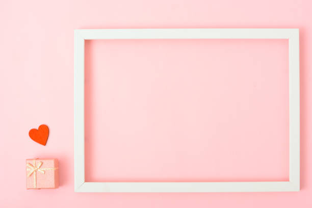 istock Valentine's Day Concept, Top view Flat lay, photo frame on Pink background 1204946744