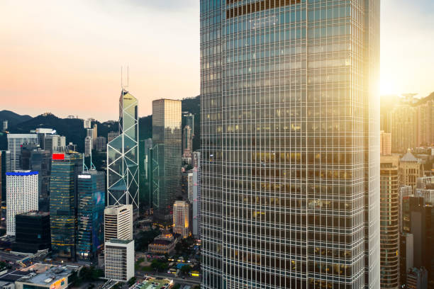 istock Office building at twilight with illuminated windows 1204947644