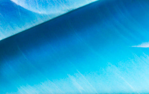 istock Blue Iceberg Closeup Abstract Background Antarctica 1204953160