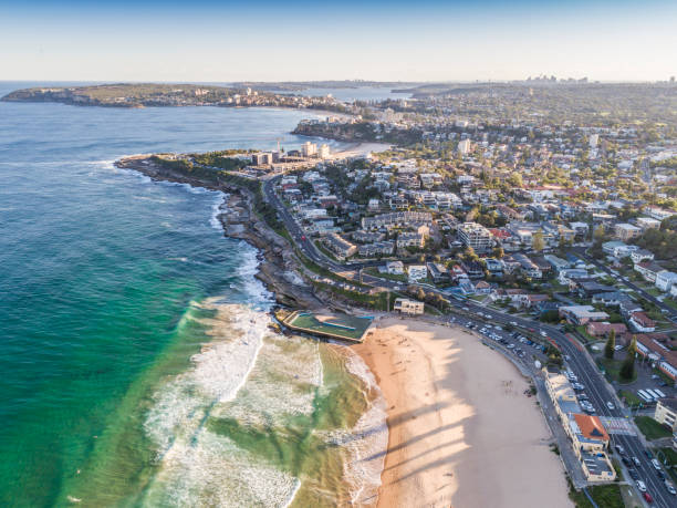istock Surfers at the beach in Sydney, Australia 1204966798