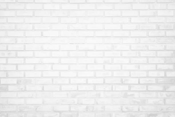 istock White brick wall texture background in room at subway. Brickwork stonework interior, rock old clean concrete grid uneven abstract weathered bricks tile design, horizontal architecture wallpaper. 1204978450