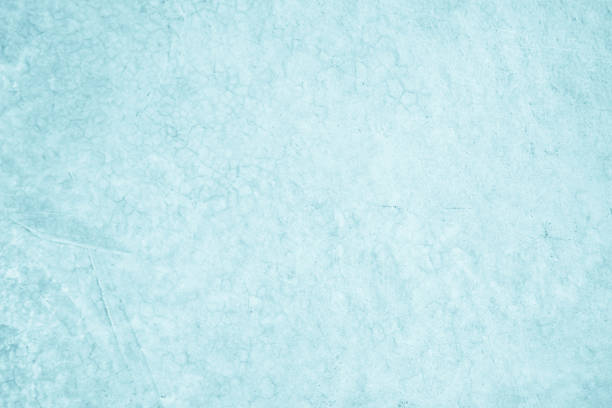 istock Pastel Blue and White concrete stone texture for background in summer wallpaper. Cement and sand wall of tone vintage. Concrete abstract wall of light blue color, cement texture background for design. 1204978571