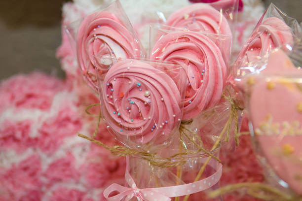istock Round twisted candies on a stick. 1204979617