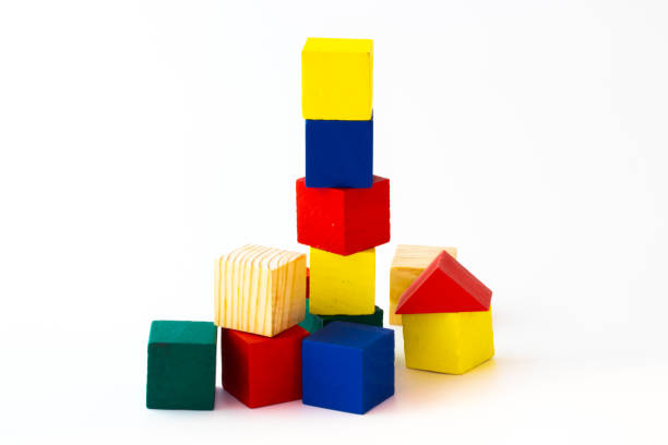 istock Toy wooden building blocks on white background 1204980685