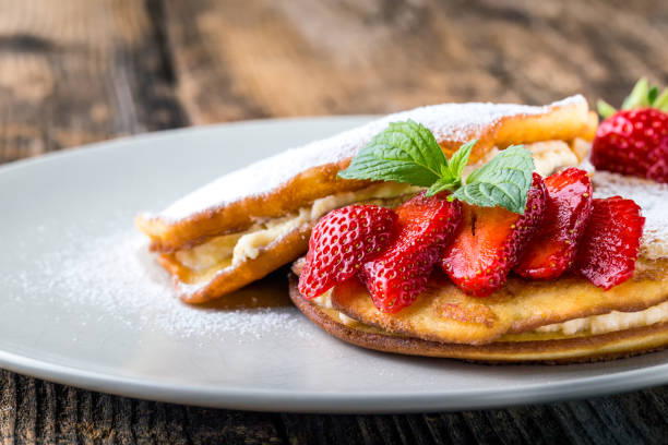 istock filled with homemade pancakes with strawberries 1204981259