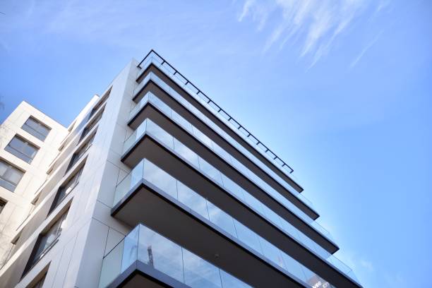 istock Modern and new apartment building. 1204984385