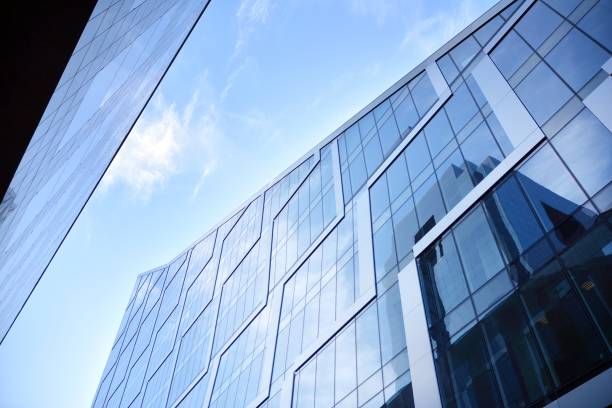 istock Abstract reflection of modern city glass facades. 1204984415